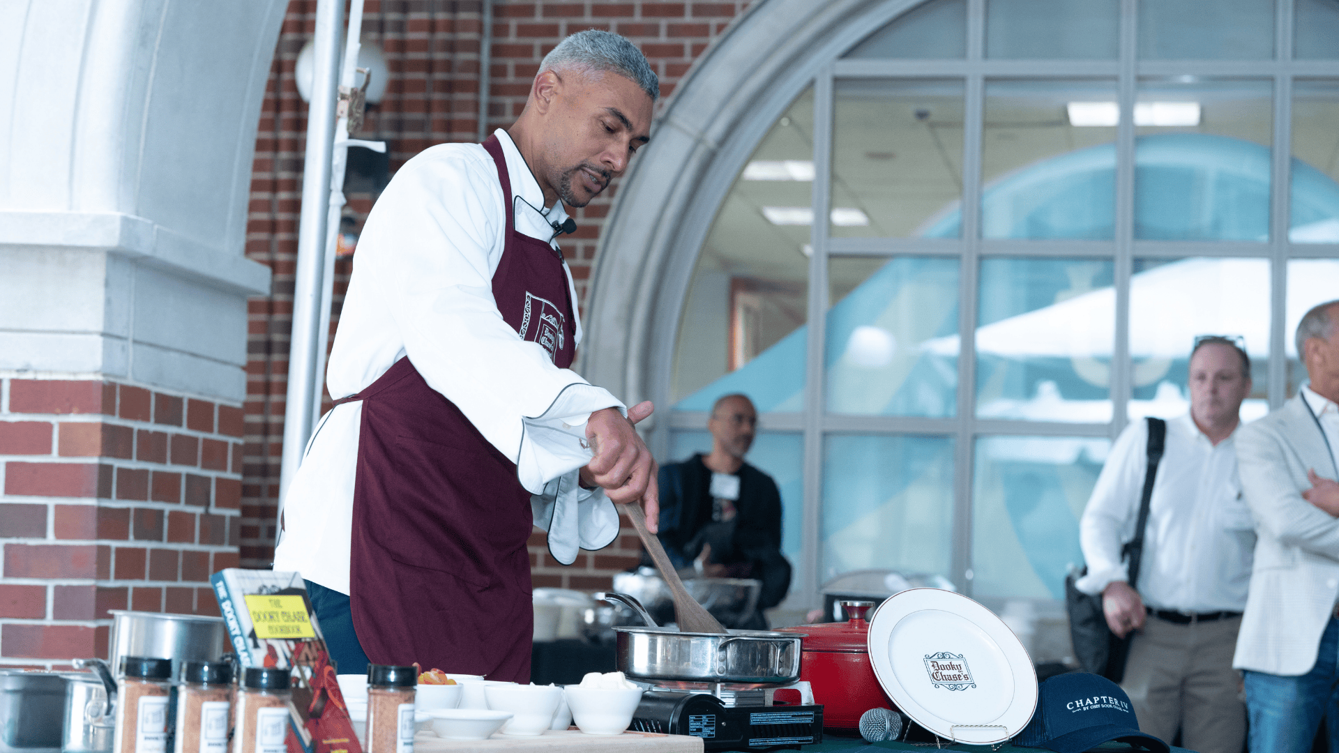 Chef Dook Chase does a cooking demonstration outside in the law school courtyard.