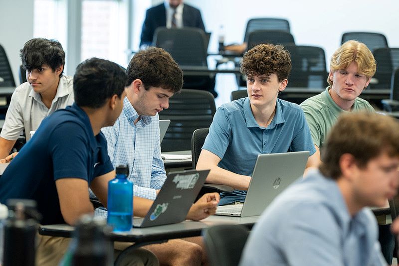 Photo of students working together at the Sports Institute