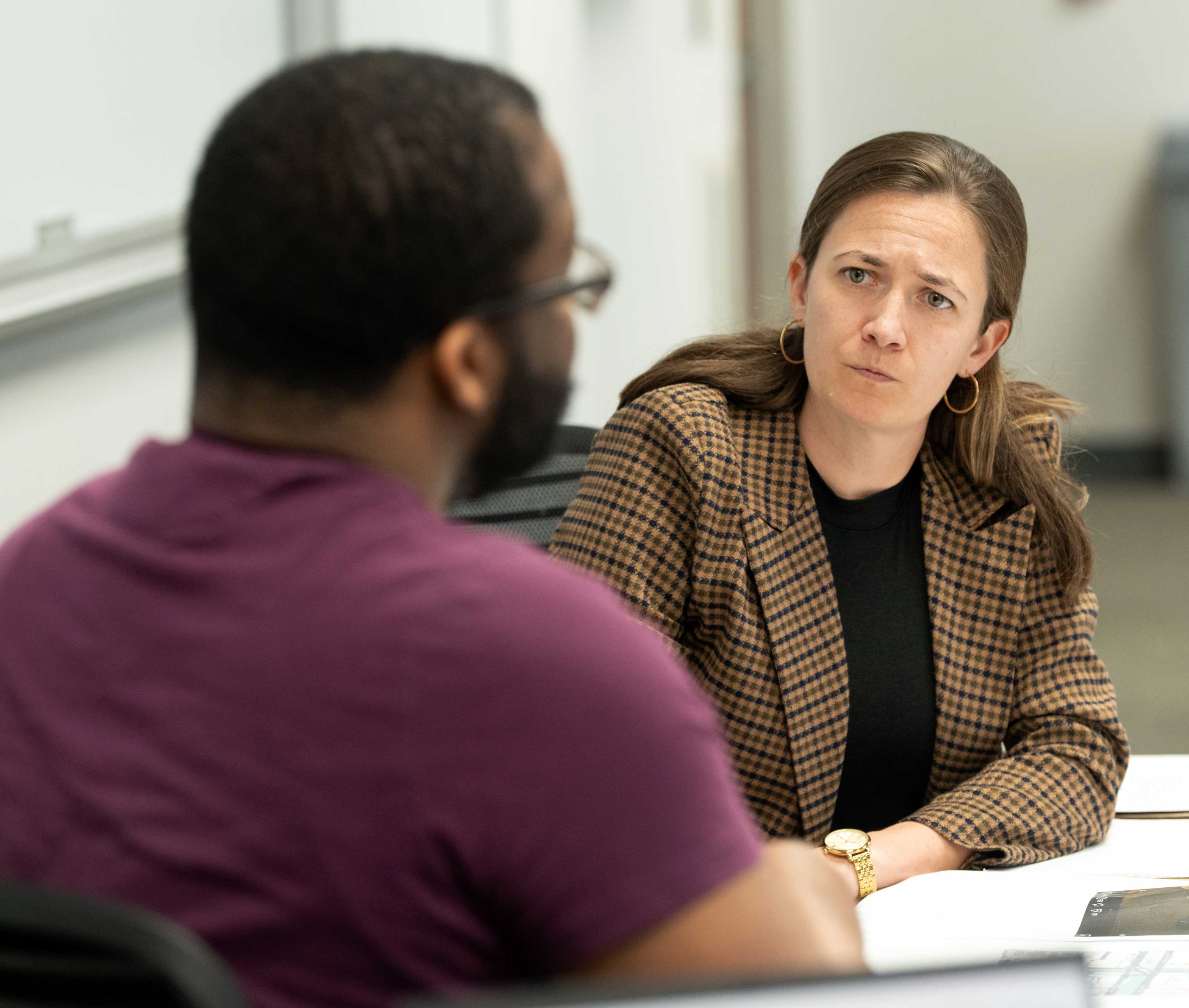 Student attorney talking to client