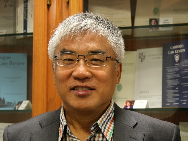Guiguo Wang