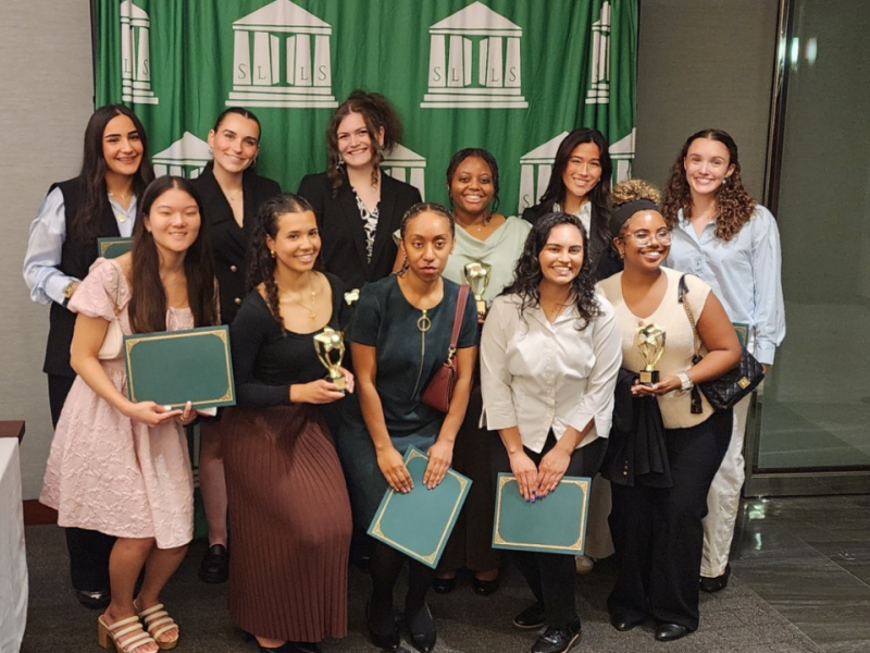 Students pose for a group photo at the SLLS Awards event,