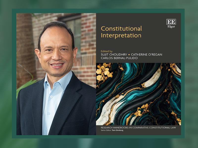 Smiling man in a suit next to "Constitutional Interpretation" book cover with teal and gold design.
