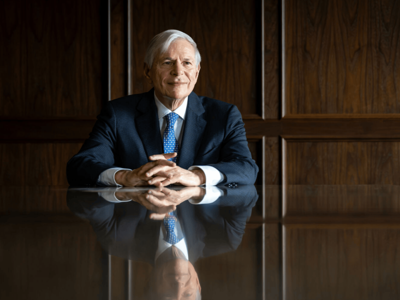 David Kerstein sits at a boardroom table.
