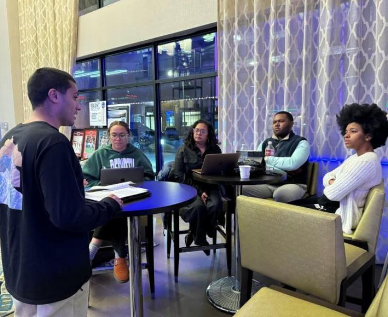 Qamar delivers pre-competition arguments to his coaches.