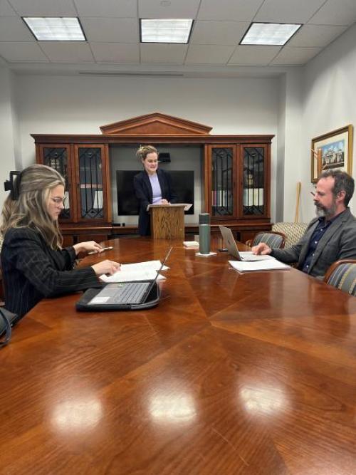 Brandao, right, mooting a case with two students who recently argued before the Fifth Circuit.