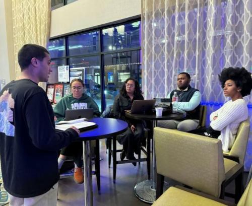 Qamar delivers pre-competition arguments to his coaches.
