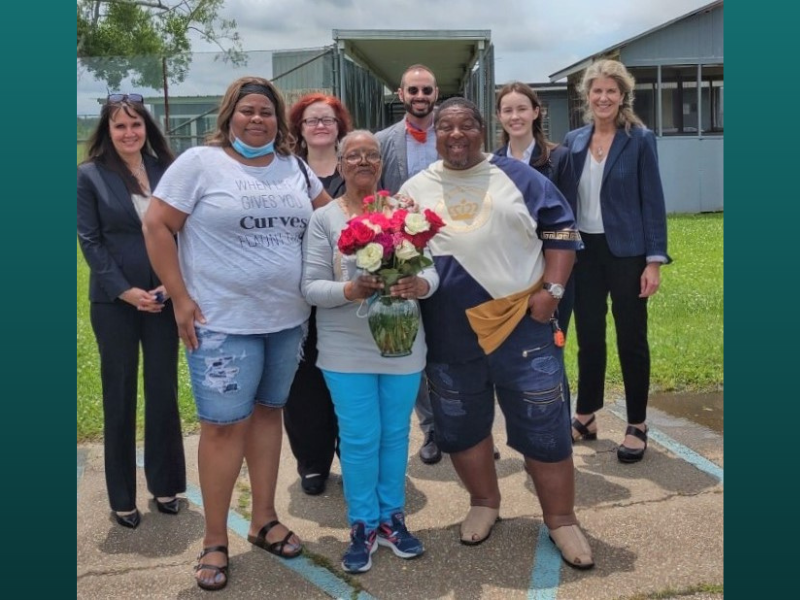 WPP team members with a client who was released in 2021 after serving 37 years, 8 months, and 17 days for an act of self-defense against sexual assault. (Photo Credit: WPP)