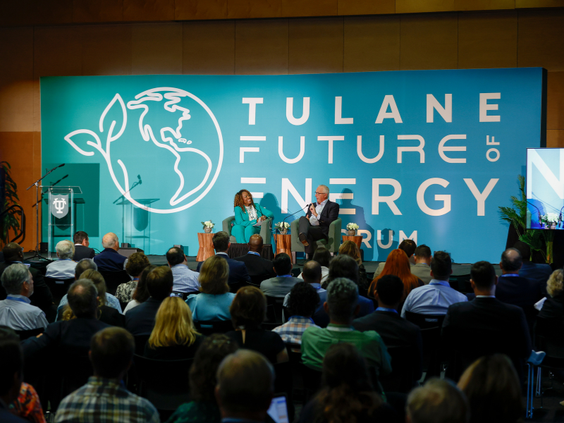 Dean Burke and Bobby Tudor sit on stage at the Future of Energy Forum.