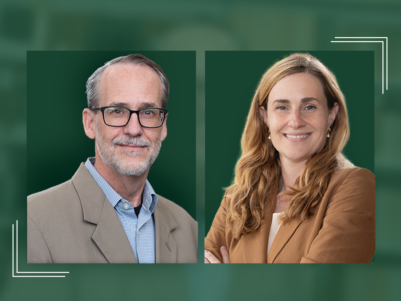 Two smiling professionals, a man in glasses and a woman with crossed arms, against a dark green background.