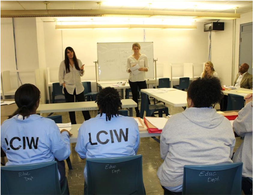 Teachers in front of classroom