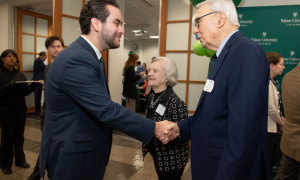 Second-year law student Pablo Gonzales, left, meets Mina and Ernest O'Bannon, the donors behind his law scholarship.